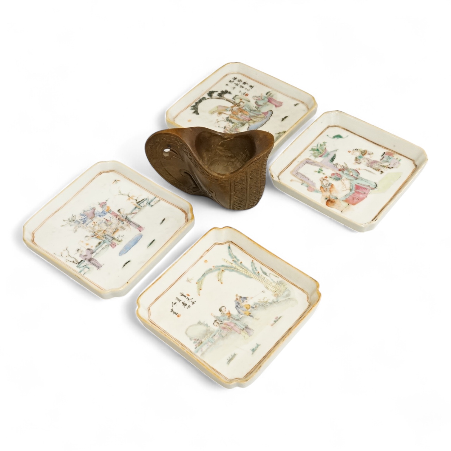 A set of four Chinese famille rose square dishes, late 19th century, and a carved wood pouring vessel, dishes 13.5cm square